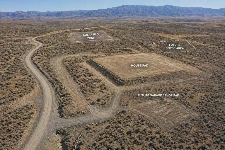 Phased off-grid land development showing road pad septic and solar layout